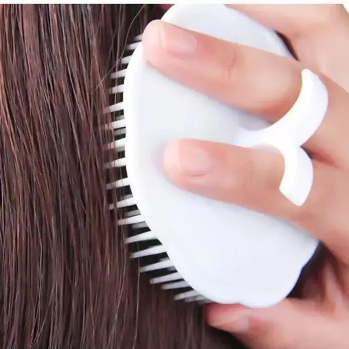 Peigne à cheveux noir, masseur de cuir chevelu