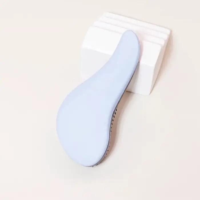 Brosse démêlante antistatique massante