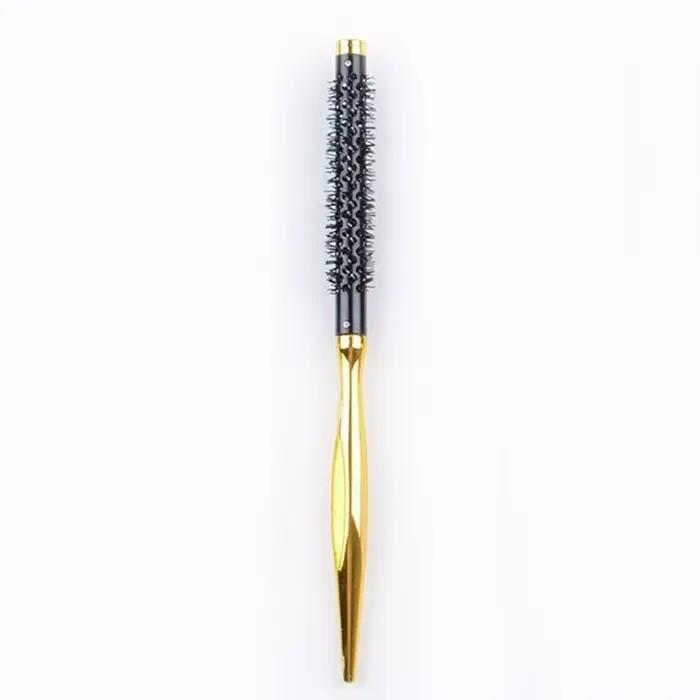 Brosse à boucler compacte avec manche lisse