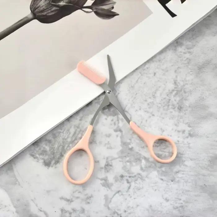 Ciseaux de coupe de sourcils roses avec peigne intégré