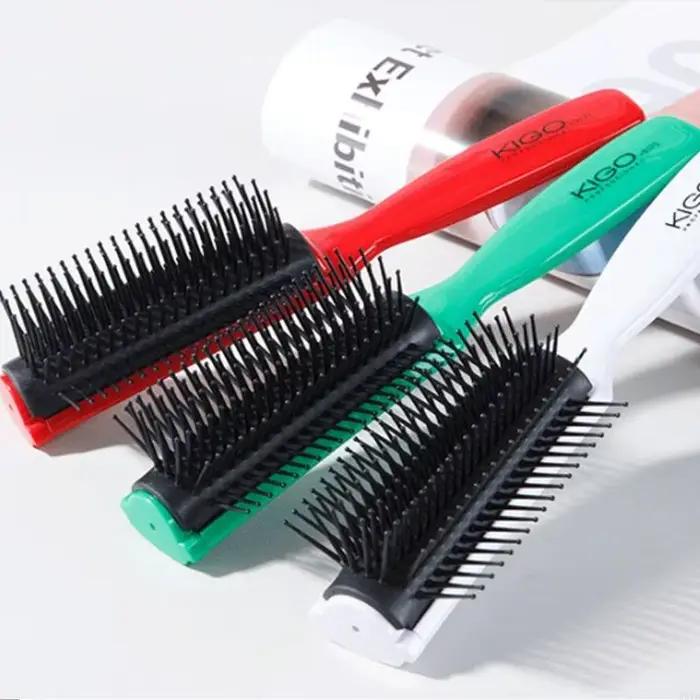 Brosse à cheveux ronde à 9 lignes légères pour lisse des performances anti-statiques pour le salon l'utilisation