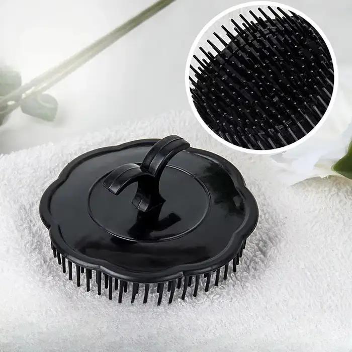 Peigne à cheveux noir, masseur de cuir chevelu