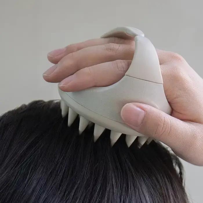 Brosse de massage pour cuir chevelu