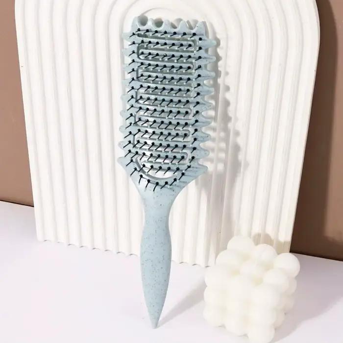 Brosse coiffante pour boucles - peigne de massage creux