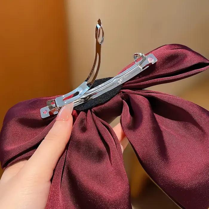 Pince à cheveux avec gros nœud rouge, petite fille, vent doux, 1