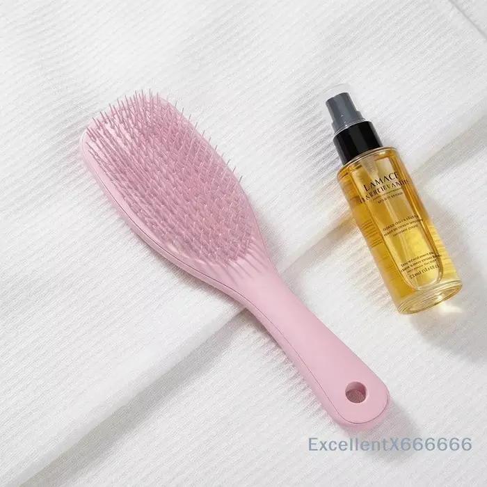 Brosse à cheveux antistatique
