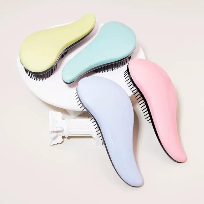 Brosse démêlante antistatique massante