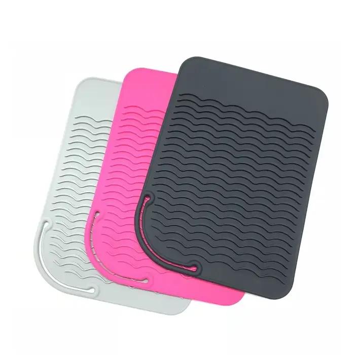 Tapis en silicone antidérapant et portable résistant à la chaleur pour outils de coiffure