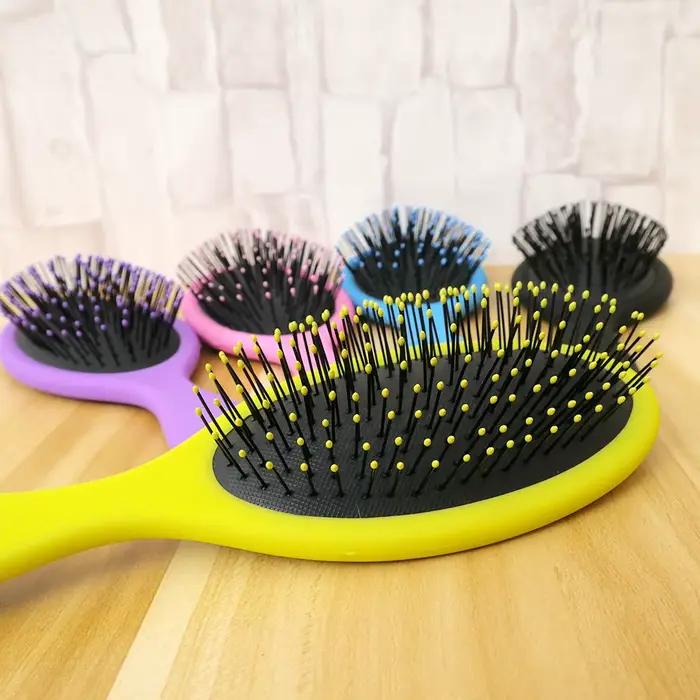 Peigne de douche à cheveux avec poignée magique enchevêtrée