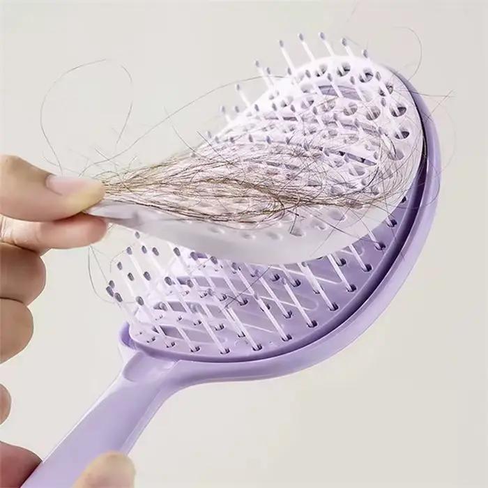 Brosse à cheveux autonettoyante et masseur du cuir chevelu