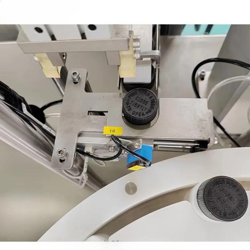 Machine de remplissage et de capsulage Machine de remplissage et de capsulage de couvercles de protection Machine de capsulage de bouchons à l'épreuve des enfants