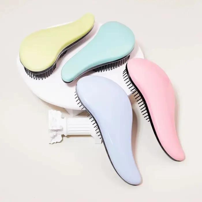 Brosse démêlante antistatique massante pour cheveux bouclés mouillés